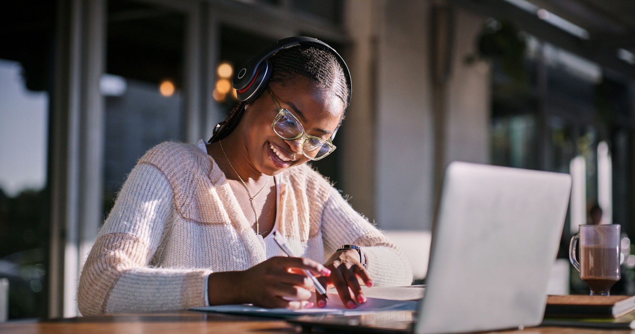Student studying on her laptop. Doing functional GCSE skills.